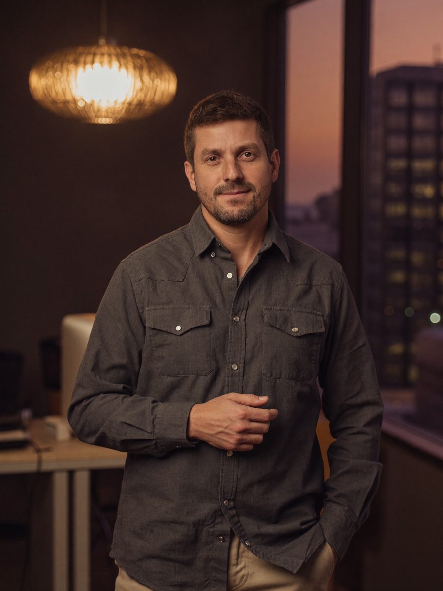 Diego Mondevaim in the office at dusk